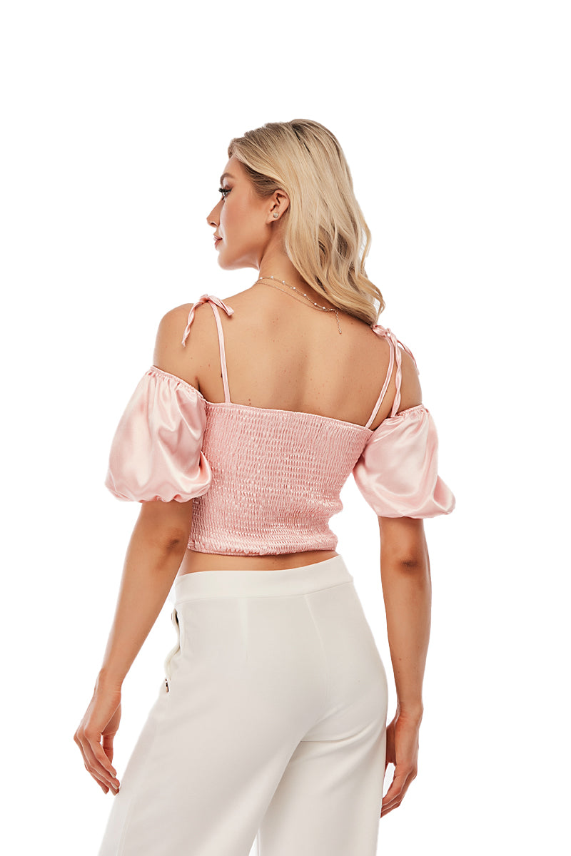 Pink cold shoulder bow top