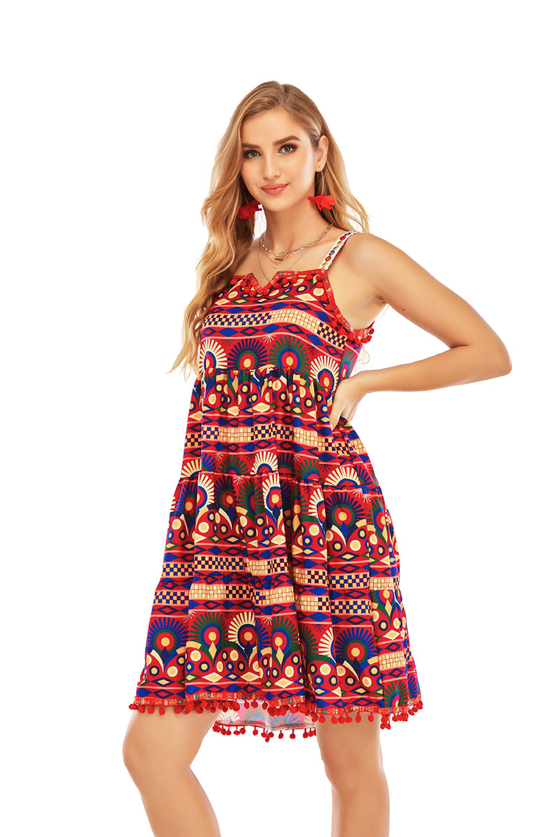 PRINTED DRESS WITH TASSELS