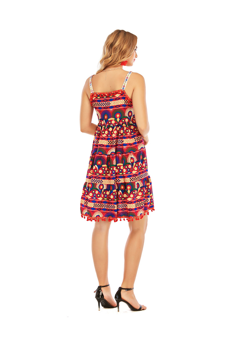 PRINTED DRESS WITH TASSELS